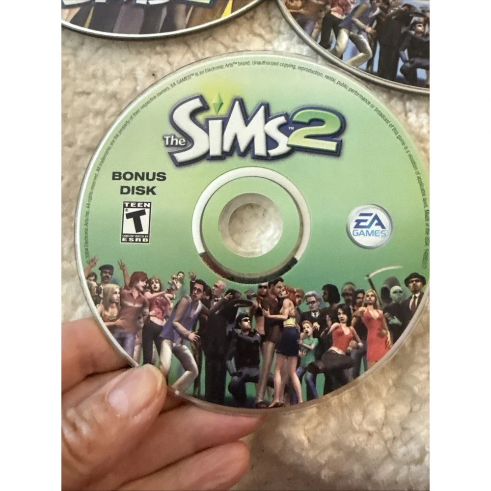 The Sims 2 (PC, 2004 - 5 Discs) Complete No Manual Pre Owned Case Needs Work